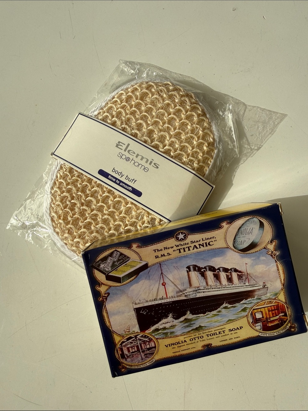 Vinolia bath soap and ELEMIS Beige Spa Body Buff Exfoliating Pad